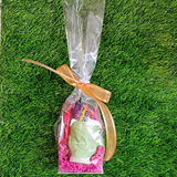 The Candy Bar Easter Egg Cup filled with Cadbury Creme Egg on astroturf background